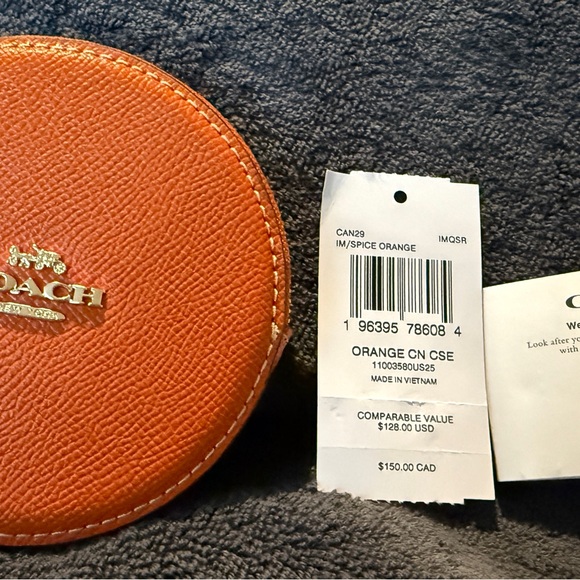 Coach Handbags - Coach Orange Round Coin Purse NWT